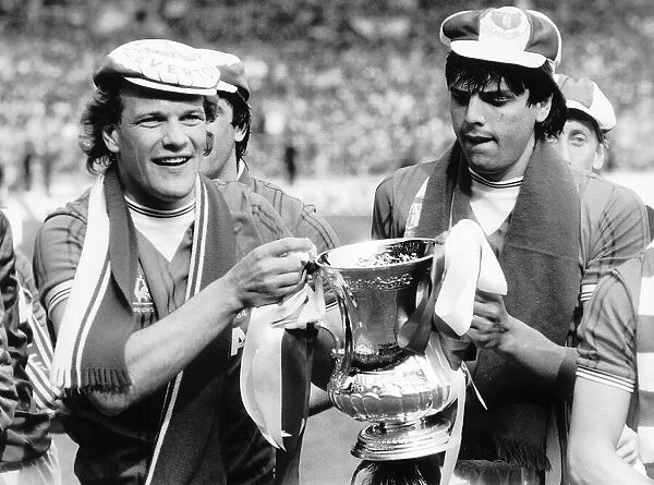 Andy Gray left and Graeme Sharp of Everton May 1984 hold the FA Cup after they had