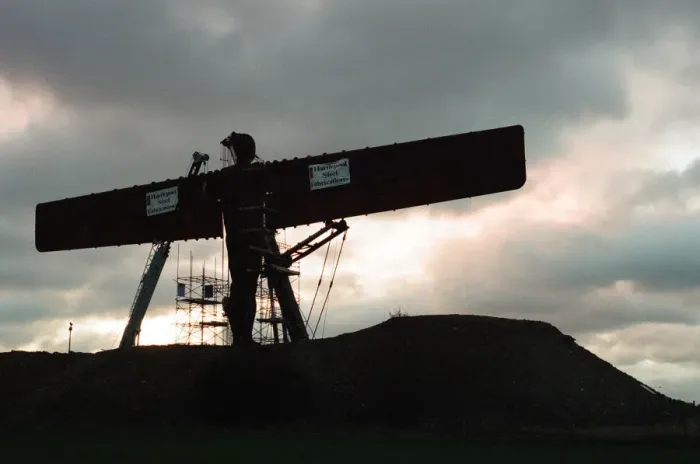 Framed Print : The Angel of the North faces its first dawn on the hill, Gateshead. 16th February 1998