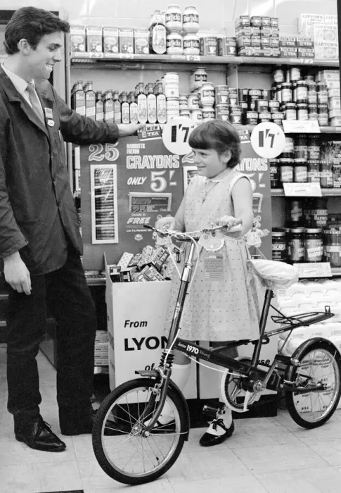 Framed Print : Angela Moore is pictured in a Coventry store with her new bicycle which she won in a Framed Print : Angela Moore is pictured in a Coventry store with her new bicycle which she won in a