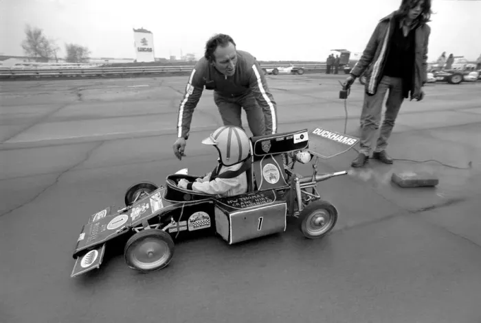 Framed Print : Angela four year old daughter of Ken James seen here at the wheel of her miniature petrol