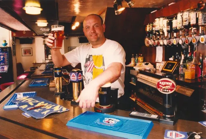 Framed Print : Angelic Upstarts - chatting from behind the bar of his own idyllic country pub Framed Print : Angelic Upstarts - chatting from behind the bar of his own idyllic country pub