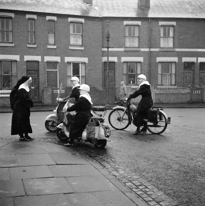 Framed Print : The Angels are three nuns who live in the toughest district of Foleshill