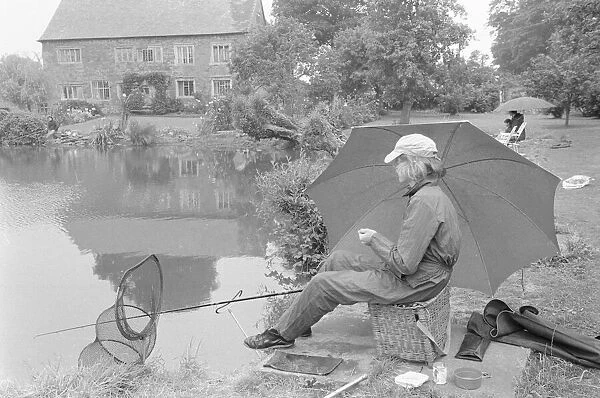 Anglers gathered at Wilfreds Pond near Hose in the Vale of Belvoir