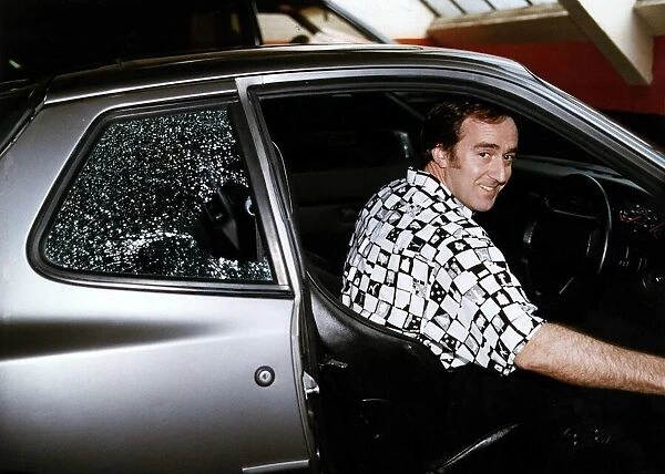Angus Deayton Actor and TV Presenter gets into his car