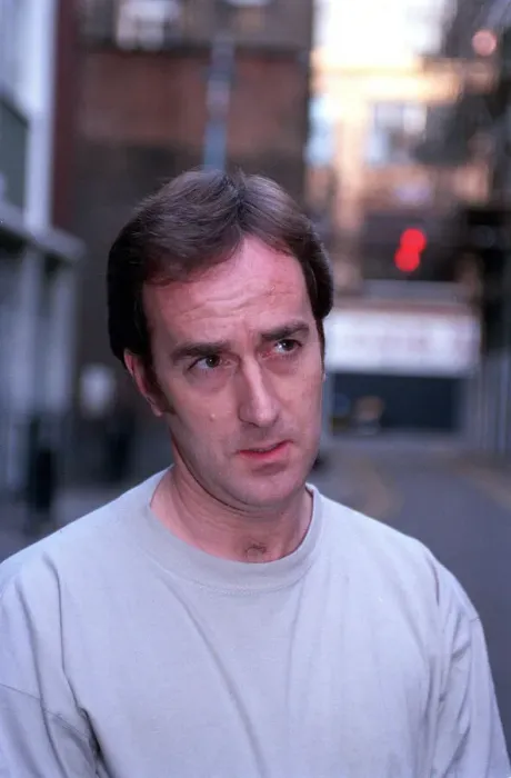 Framed Print : ANGUS DEAYTON WEARING T-SHIRT AND JEANS OUTSIDE SAVING HIS SOHO OFFICE IN LONDON