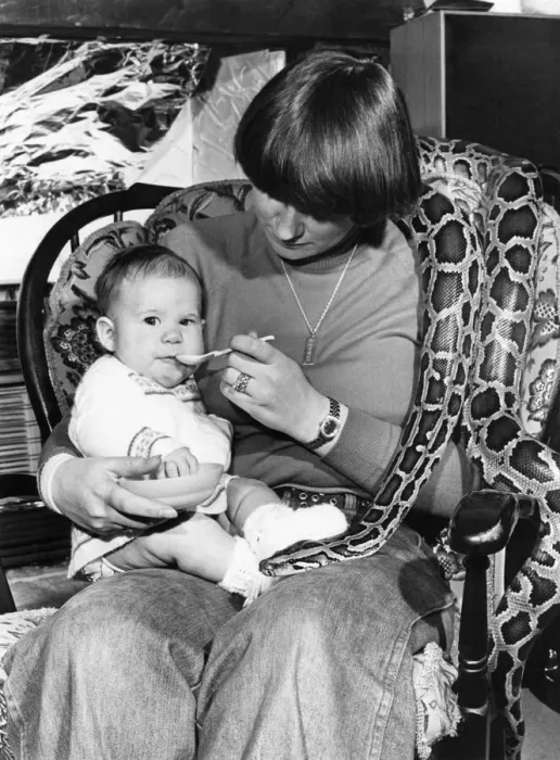 Framed Print : Animals Snakes and Children. Melanie demonstrates just how cuddly a pet a python can be Framed Print : Animals Snakes and Children. Melanie demonstrates just how cuddly a pet a python can be