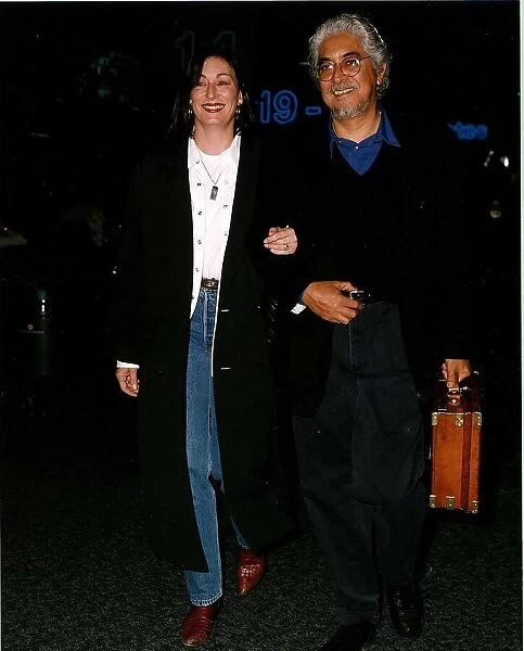 Anjelica Huston actress with her husband Robert Graham leaving Heathrow for Los Angeles