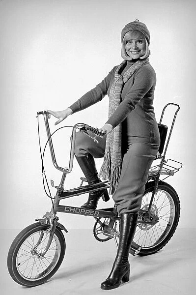 Ann Aston seen here in the studio modelling the new Chopper bike Circa 1975