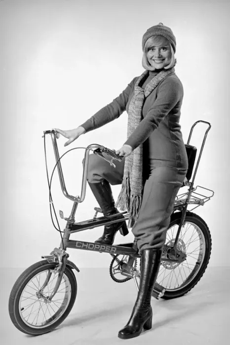 Framed Print : Ann Aston seen here in the studio modelling the new Chopper bike Circa 1975 Framed Print : Ann Aston seen here in the studio modelling the new Chopper bike Circa 1975