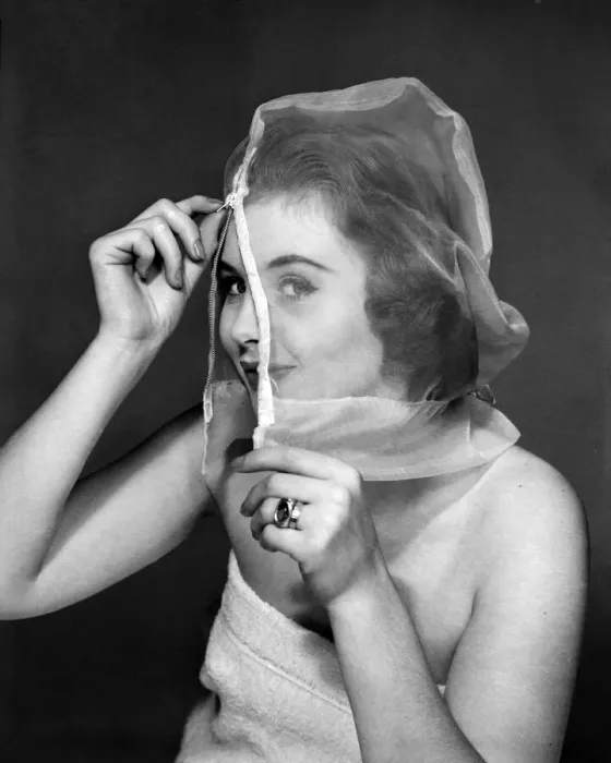 Framed Print : Ann Cave, model, poses with a make up mask, 29th October 1957