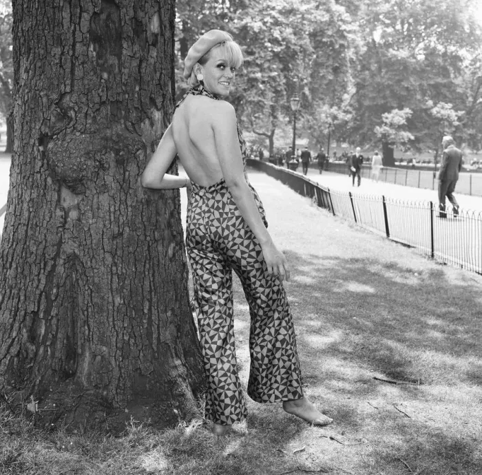 Framed Print : Ann Nightingale aged 25 blonde and barefoot seen here wearing a cat suit in navy