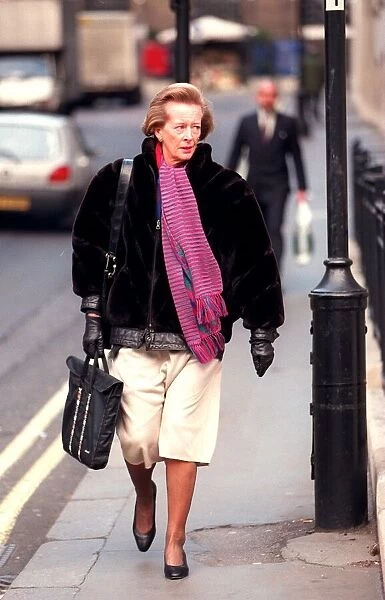 Anne Bullen former secretary of Robin Cook January 1998 Walking Carrying bag White