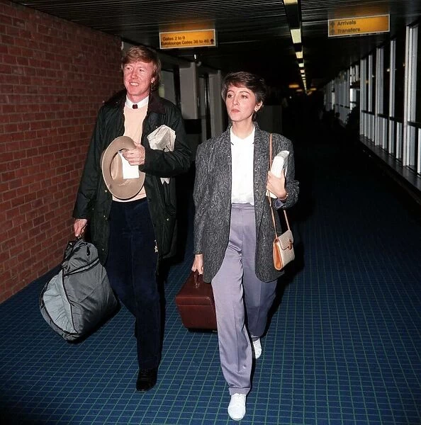 Anne Diamond TV Presenter at London Airport December 1986 with har husband Mike