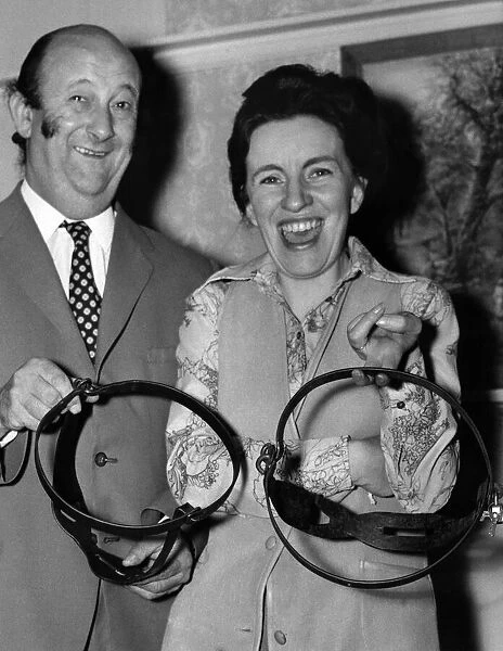 Anne and Robin Hugesson having a good look over the two Chastity belts