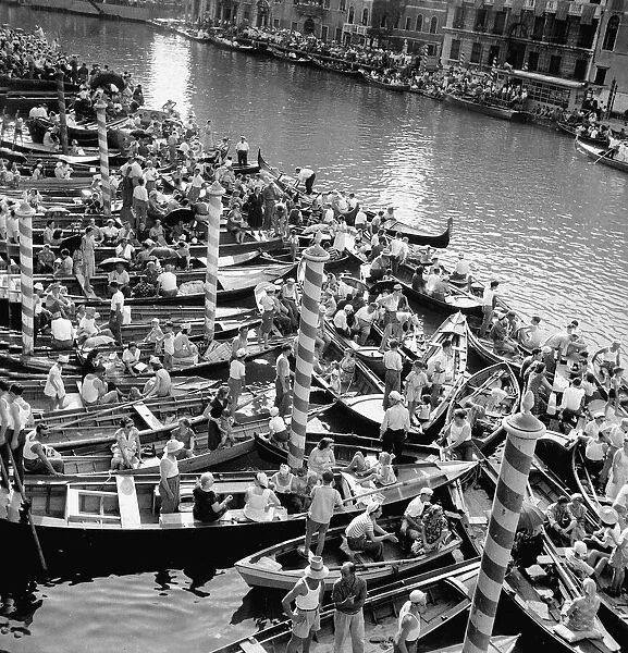 Annual historic Regatta on the Grand Canal in Venice, Italy Audience in boats