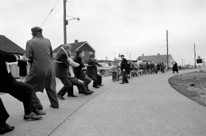 Framed Print : The annual Tug O war battle of the sexes took place yesterday outside the Pilot Pub
