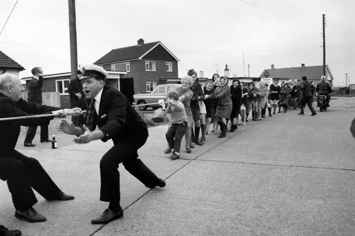 Framed Print : The annual Tug O war battle of the sexes took place yesterday outside the Pilot Pub
