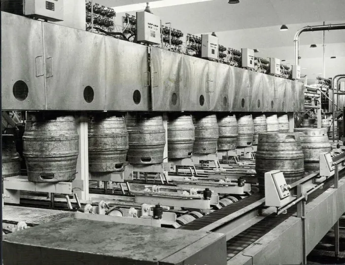Framed Print : Ansells Brewery. Beer kegs being filled, and full ones discharged