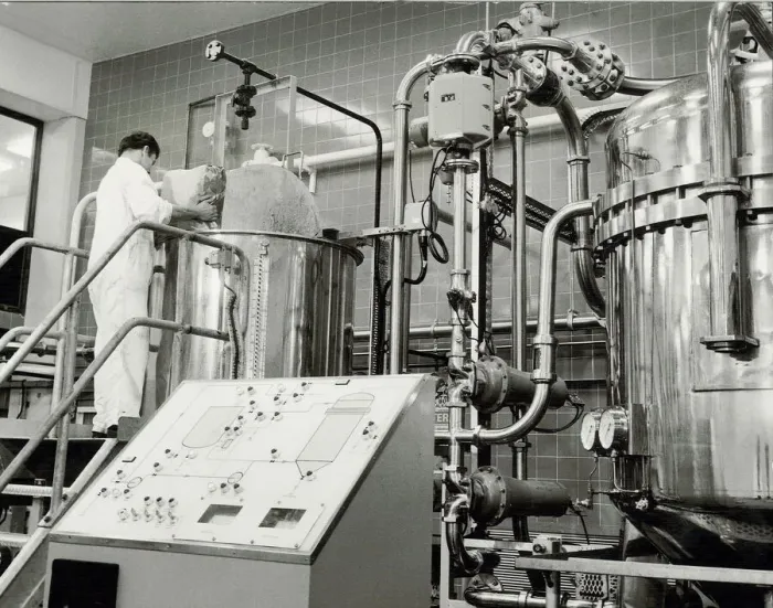 Framed Print : Ansells Brewery. A process operative adding a filtering agernt into the automatic