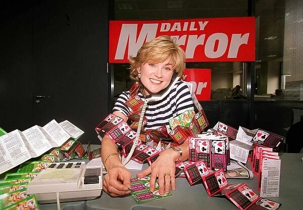 Anthea Turner TV Presenter Mans the Daily Mirror phones for National Lottery Scratchcards
