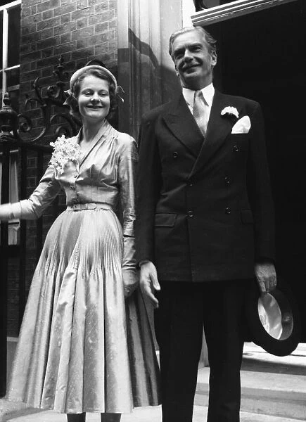 Anthony Eden and Clarissa Churchill on the day of their wedding standing outside Number