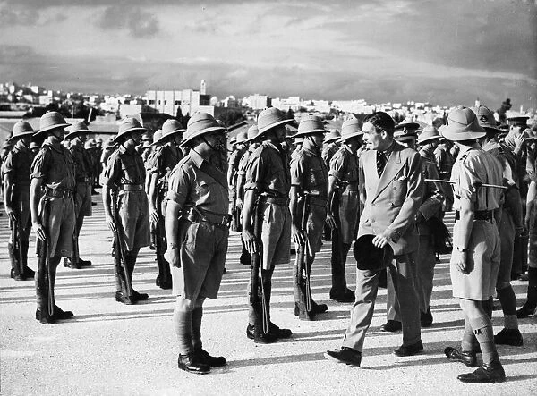 Anthony Eden inspecting soldiers of the Bedfordshire and Hertfordshire regiments at their