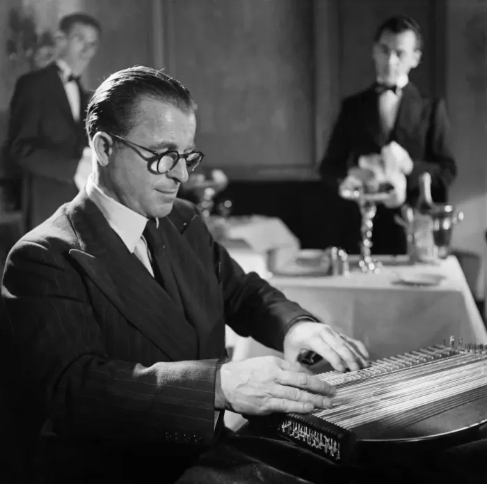 Framed Print : Anton Karas playing the zither at Londons Empress Club Framed Print : Anton Karas playing the zither at Londons Empress Club