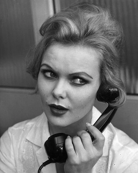 Applying Make up lessons with Jocylyne Wiseman. Woman talking on the telephone