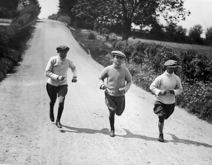 Framed Print : Apprentice jockeys jogging down a country lane during training to reduce their weight for Framed Print : Apprentice jockeys jogging down a country lane during training to reduce their weight for