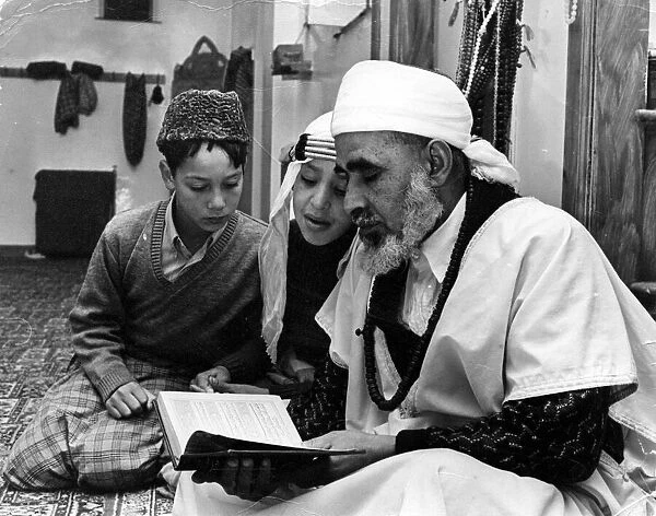Two arab boys born in Cardiff receive instruction on the Koran