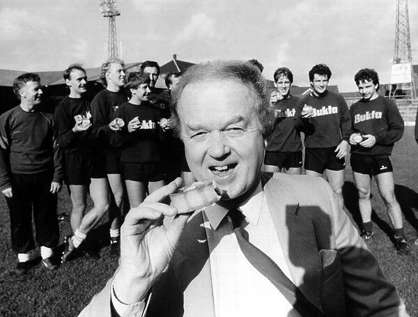 Archie Macpherson football commentator & television presenter pictured eating a pie circa