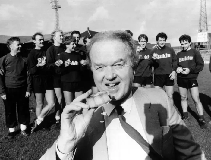 Framed Print : Archie Macpherson football commentator & television presenter pictured eating a pie circa