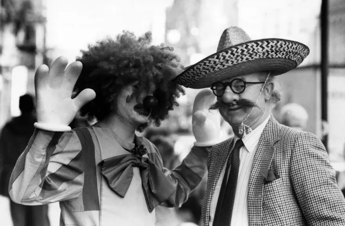 Framed Print : Archie MacPherson Sports Commentator with glasgow student Finlay Jollife dressed as a Framed Print : Archie MacPherson Sports Commentator with glasgow student Finlay Jollife dressed as a