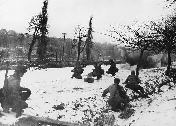 US Army Engineers clear ice on the Saar canal with dynamite. 12th January 1945