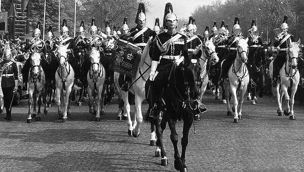 Army Household Cavalry march through the streets of Paris France on their way to lay a