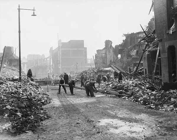 The army and salvage workers clear the bomb damage to Hull following several nights of
