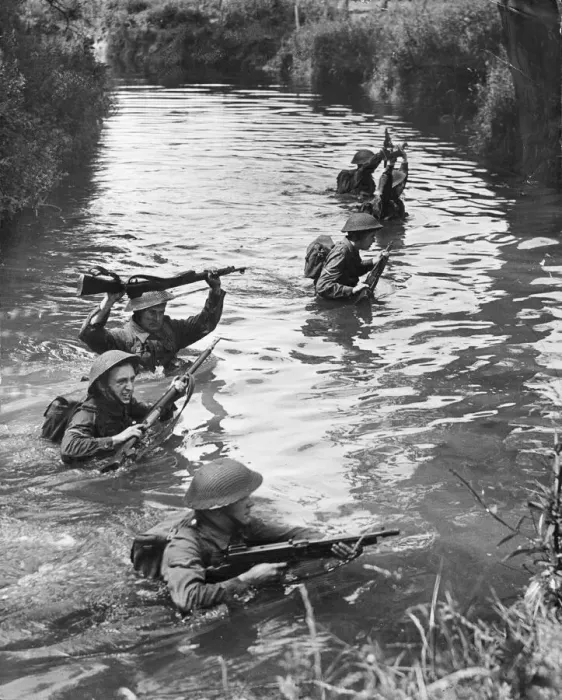 Framed Print : Army Training. Young NCOs (Non-commissioned officers) crossing a river Framed Print : Army Training. Young NCOs (Non-commissioned officers) crossing a river