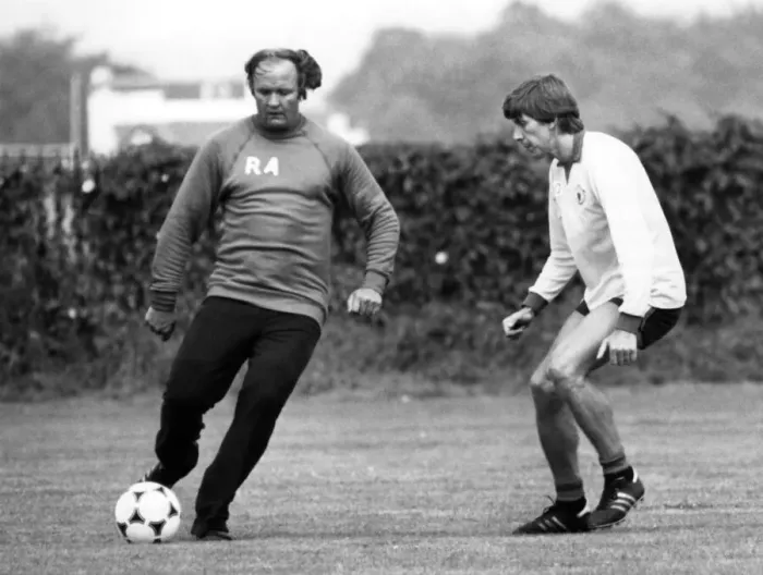 Framed Print : Arnold Muhren keeps a close eye on Manchester United manager Ron Atkinson during a Framed Print : Arnold Muhren keeps a close eye on Manchester United manager Ron Atkinson during a