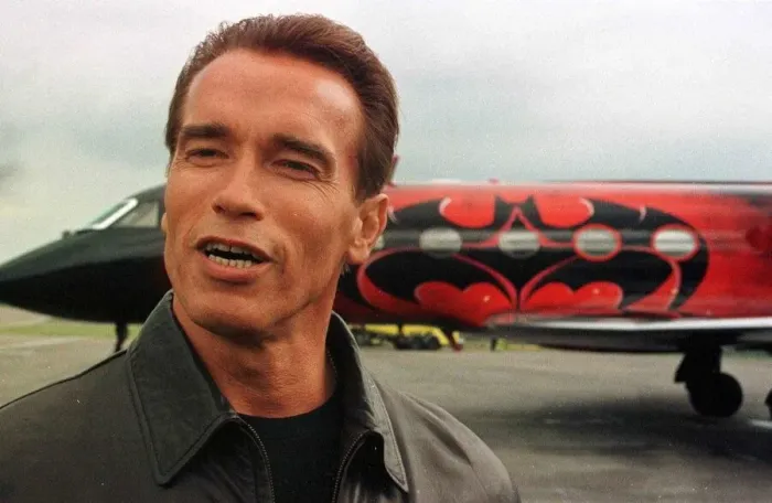 Framed Print : Arnold Schwarzenegger arrives at Luton Airport with wife Maria in Batplane Framed Print : Arnold Schwarzenegger arrives at Luton Airport with wife Maria in Batplane