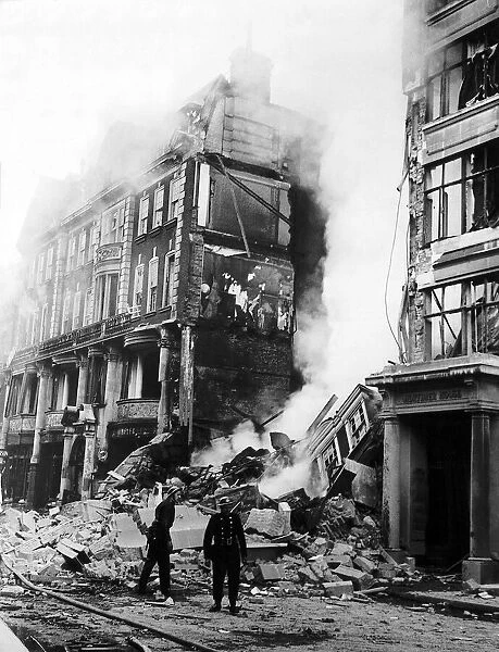 ARP men in front of a building in Marylebone London which collapsed after being hit