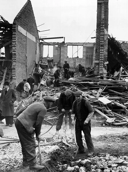 ARP men clearing damage after an air raid attack on London. Circa 1941