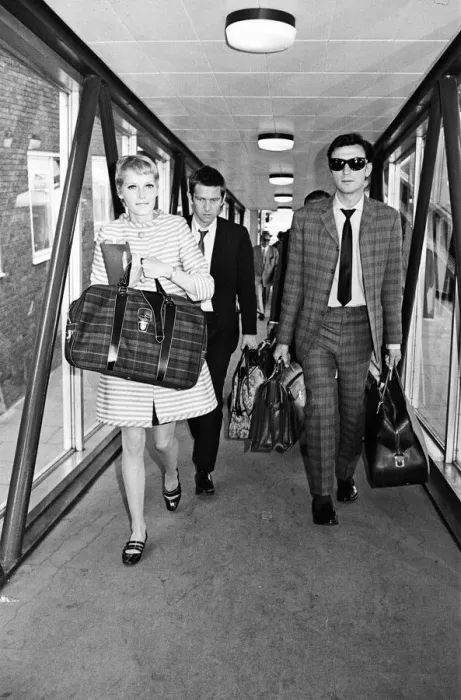 Framed Print : Arrivals at Heathrow Airport from Berlin. Actress Mia Farrow with actors Tom Courteney