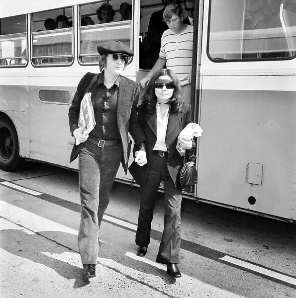 Arrivals at Heathrow. John Lennon and Yoko Ono arriving London Airport from New York