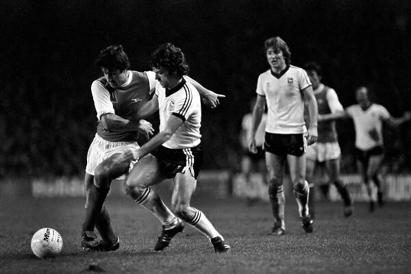 Arsenal (1) v. Ipswich (1). Brian Talbot (left) holds off John Wark