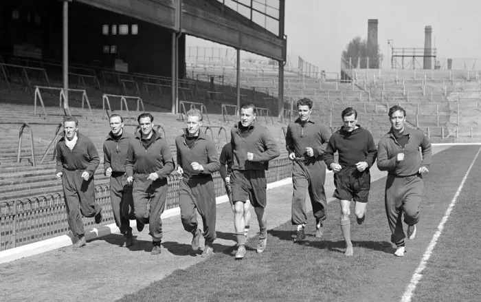Framed Print : Arsenal Football Club April 1950 Arsenal players train in front of the main east Framed Print : Arsenal Football Club April 1950 Arsenal players train in front of the main east