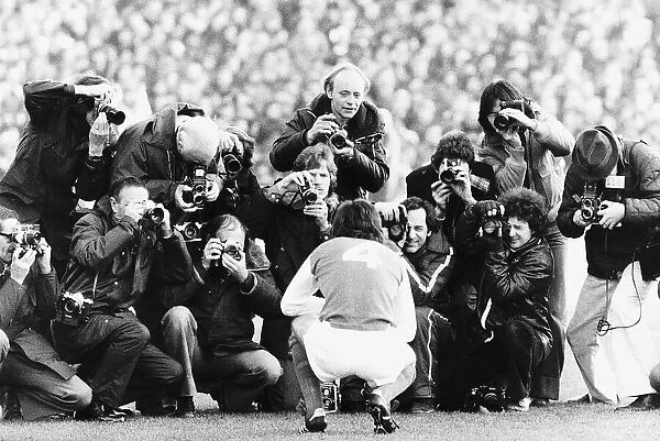 Arsenal footballer Brian Talbot surrounded by photographers. Circa 1980