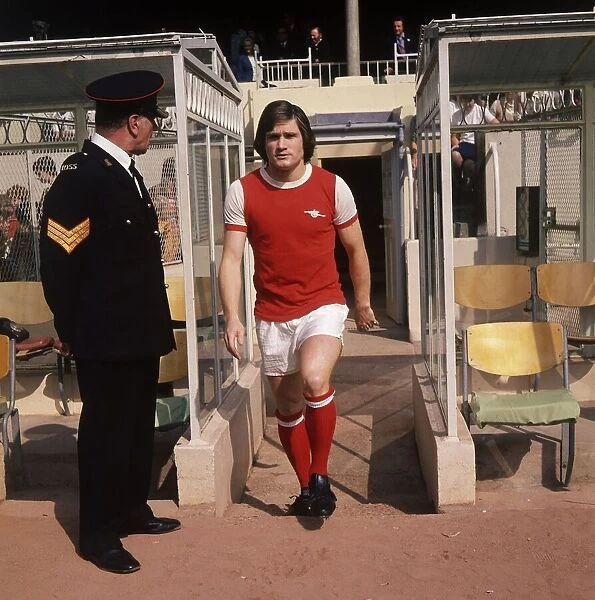 Arsenal footballer Pat Rice walking down tunnel to the pitch. Arsenal v Liverpool, 1975