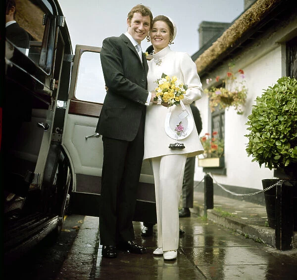 Arsenal and Northern Ireland footballer Terry Neill with his bride Sandra Litchfield