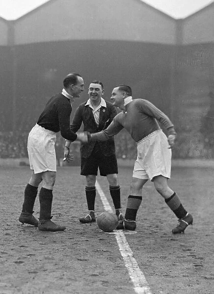 Arsenal v. Chelsea. Captains Andy Wilson and T. R Parker shake hands before the match