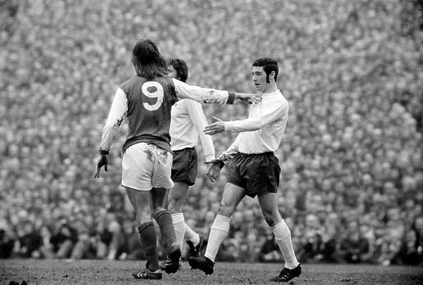 Arsenal v. Derby County F. A. Cup 5th round replay. Charlie George of Arsenal pushes away